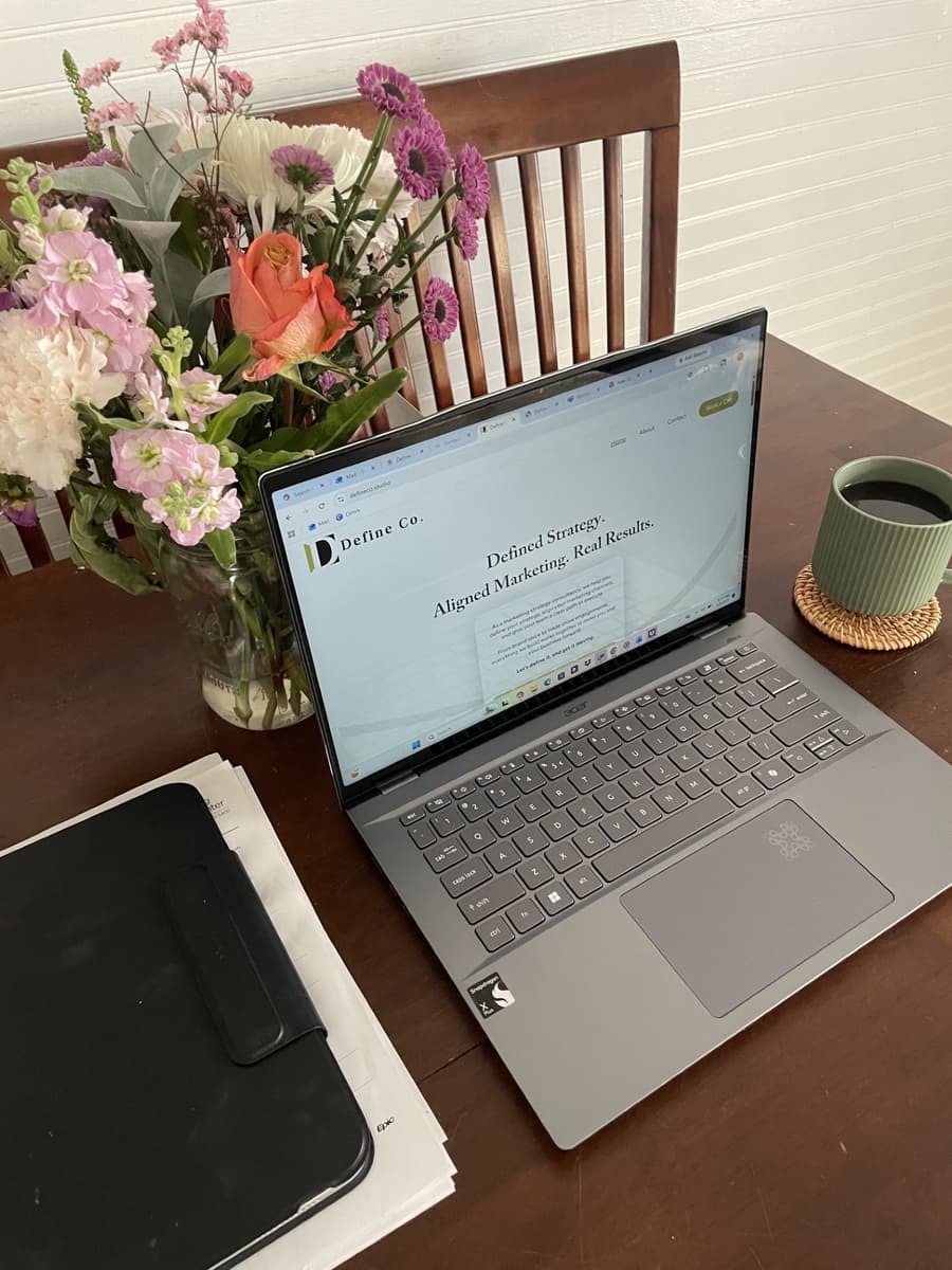 The Define Co. website open on a laptop